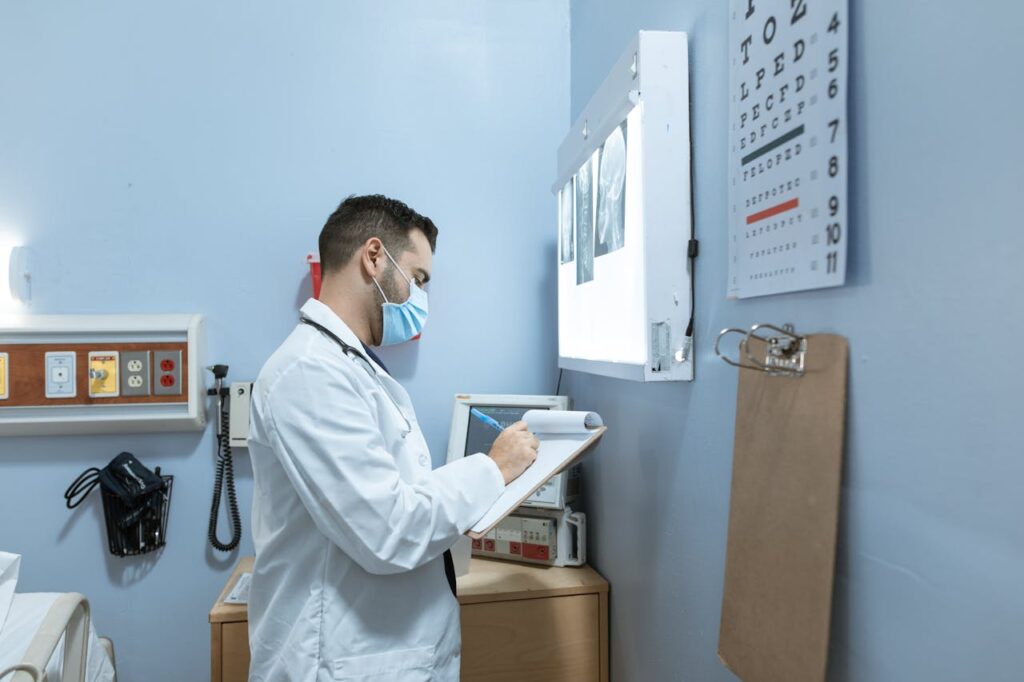 Mastering the First Impression: Your intriguing post title goes here Medical expert analyzes X-ray in hospital room, highlighting healthcare professionalism.